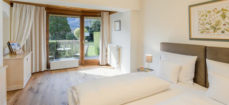 Wellnesshotel Ebner's Waldhof am See: Gartenzimmer image #4