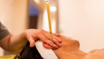 Ear candle wellness ceremony