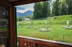 Ein Blick in den Panorama-Garten unseres Biohotels aus unserem Bio-Romantik-Doppelzimmer Lavendel mit Südbalkon. (2/3) - moor&mehr Bio-Kurhotel