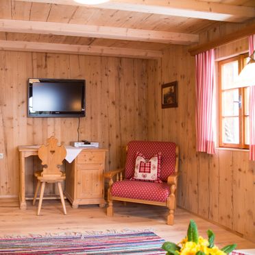 Wohnstube mit Kachelofen, Ferienhütte Windlegern, Neukirchen, Oberösterreich, Oberösterreich, Österreich