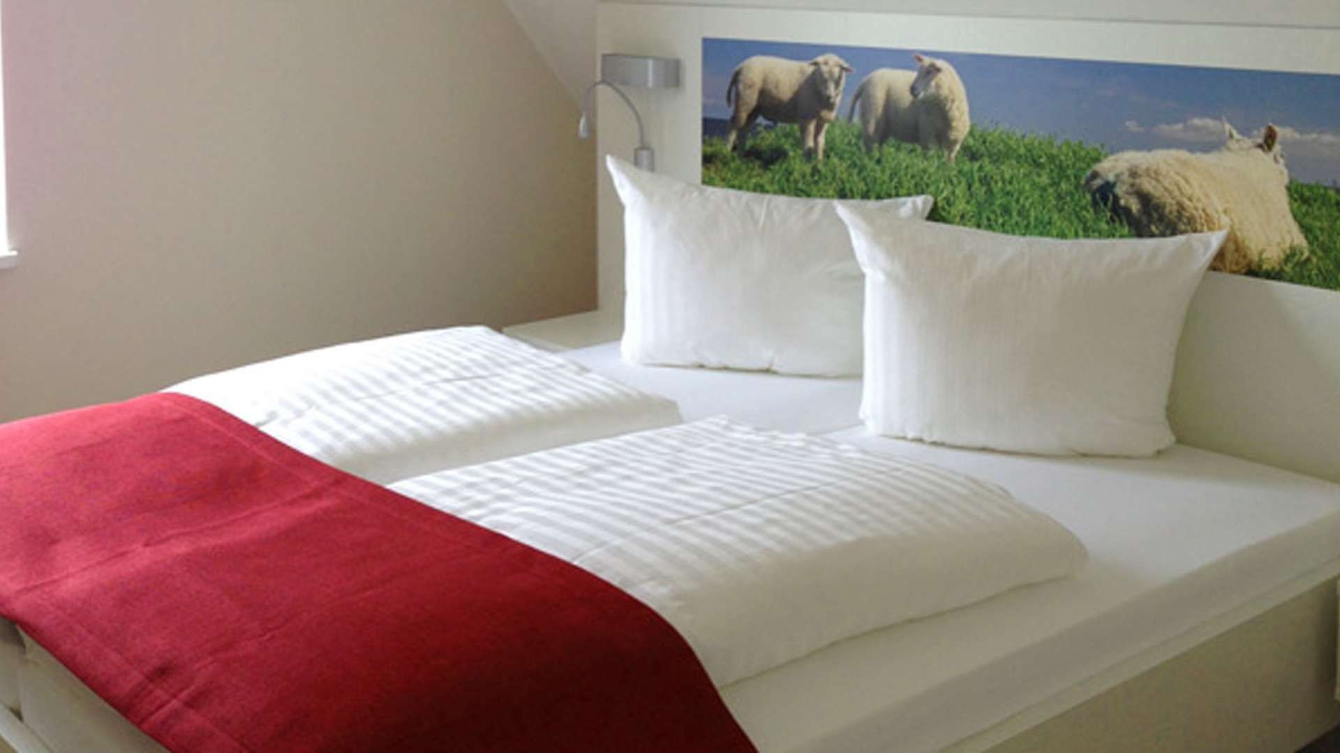 ein Schlafzimmer in der Familien-Suite Typ E