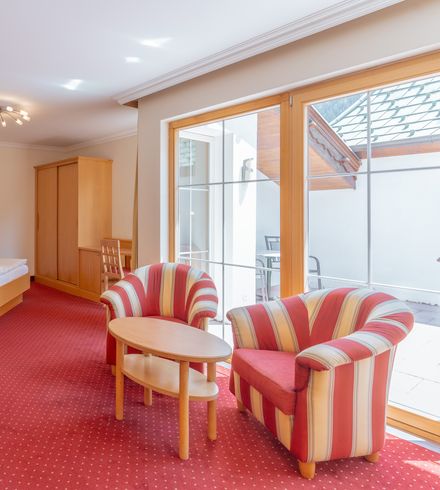 Doppelzimmer »Deluxe mit eingeschränkter Aussicht« image 1 - Familotel Stubaital Alpenhotel Kindl