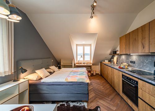 biohotel lindengut appartment kuh schlafbereicht kueche (1/4) - LindenGut