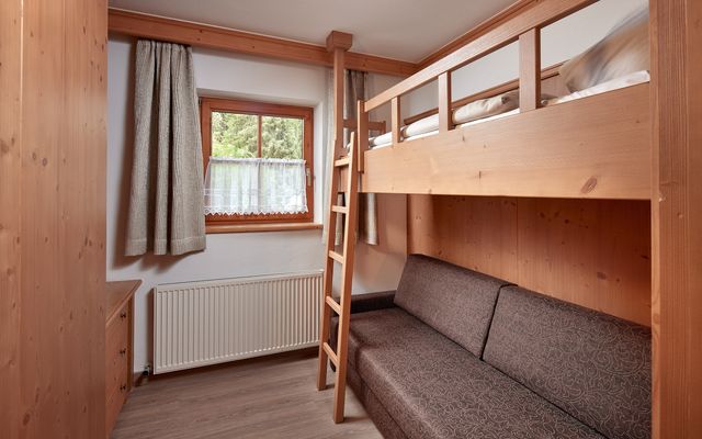 Kinderzimmer mit Etagenbett in der 4-Raum-Suite Enzian - Habachklause