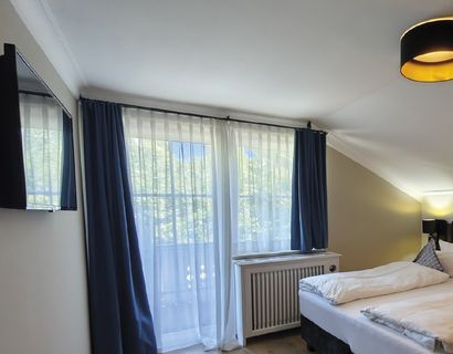 Sport- und Wellnesshotel Angerhof ****S: Suite Predigstuhl Hangseite