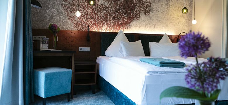 Schlafbereich im Doppelzimmer Favia in NeptunsReich