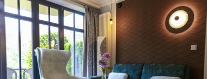 Wohnbereich im Doppelzimmer Deluxe Marigold