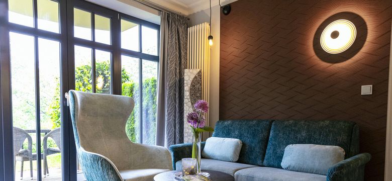 Wohnbereich im Doppelzimmer Deluxe Marigold