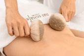 Kräuterstempel-Massage