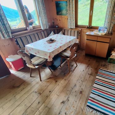 Kitchen with living area, Oberpranterhütte, Meransen, Trentino-Alto Adige, Italy