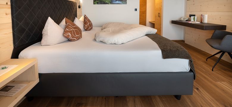 Zimmeransicht mit bequemen Boxspringbett