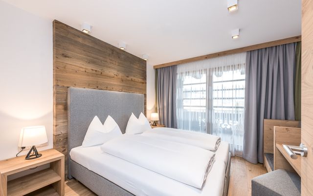Hotelzimmer Familie mit Doppelbett