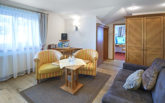 Accommodation Room/Apartment/Chalet: Family room "Parsenn