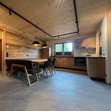 Kitchen with dining area, Lärchenchalet, Weißensee, Kärnten, Carinthia , Austria