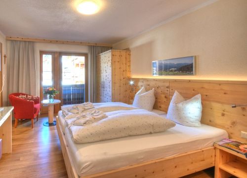 Camera tripla con balcone (1/7) - Familien- und Naturhotel Darrehof